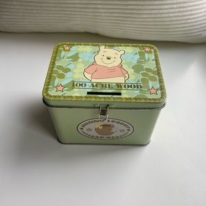 Winnie the Pooh tin bank.  Used. No lock